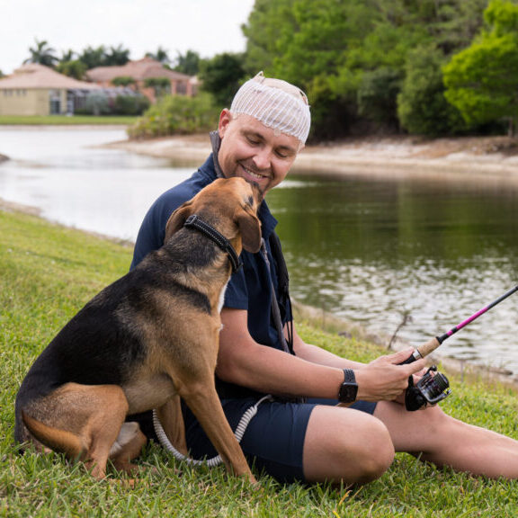 Mike Hugo fishing with his dog